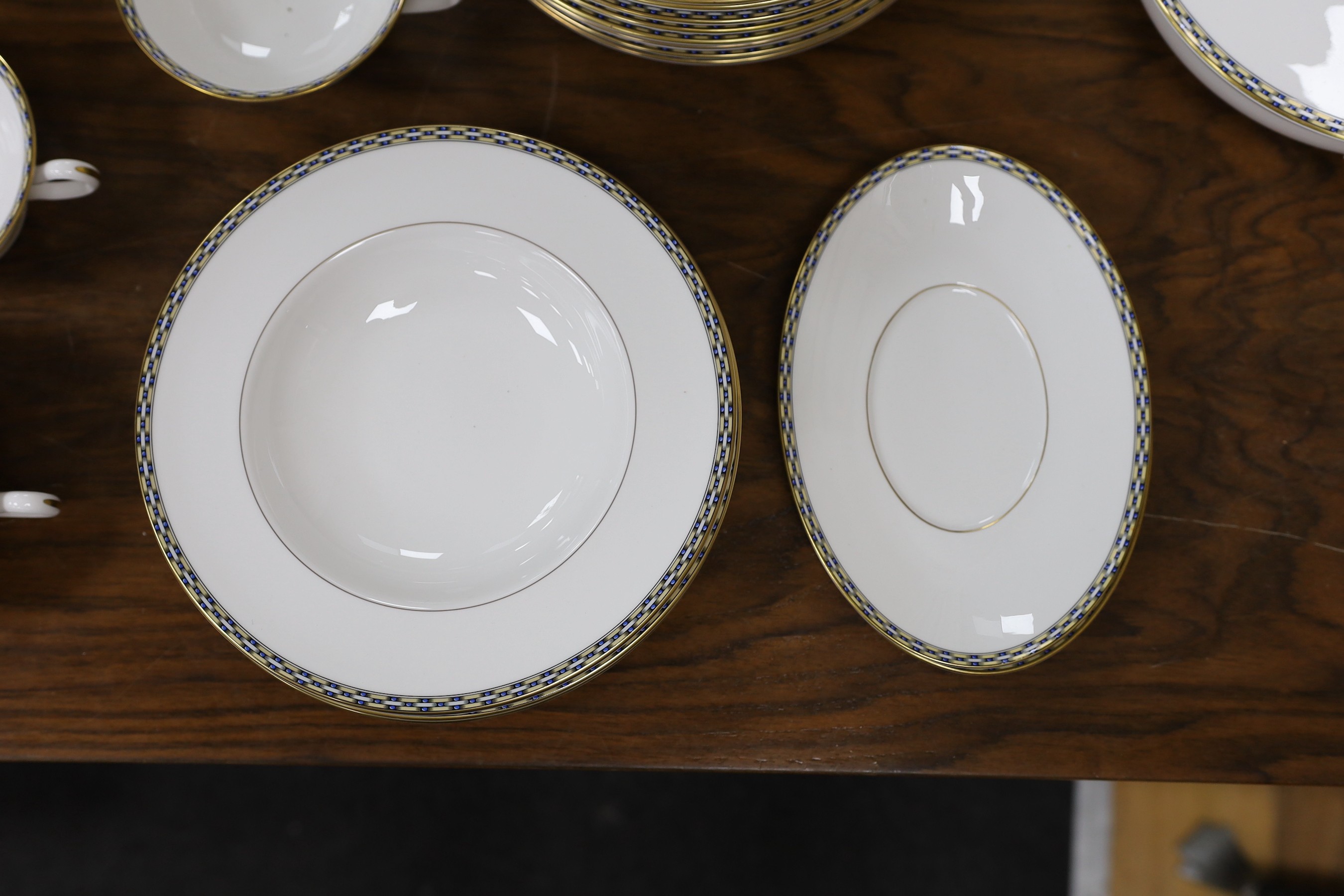A Royal Worcester Francesca pattern dinner service, settings for 12 persons.